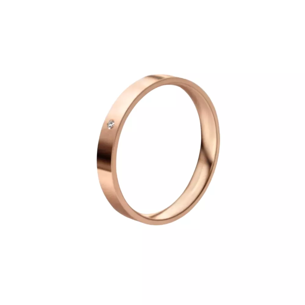 Una alianza cinta en oro rosa pulido con 1 diamante talla brillante. Espesor: 3 mm. Peso: 3 gr.