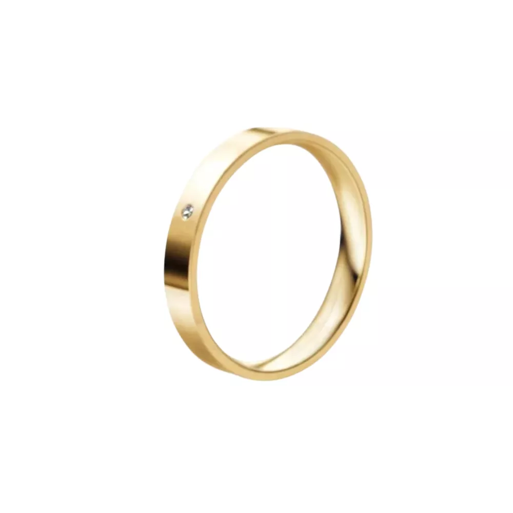 Una alianza cinta en oro amarillo pulido con 1 diamante talla brillante. Espesor: 3 mm. Peso: 3 gr.