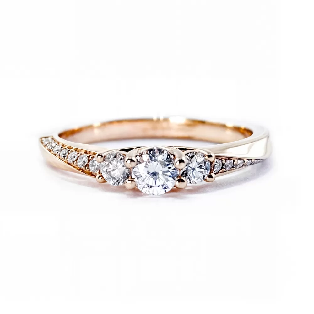 Anillo de Compromiso en oro rosa con diamante talla brillante (0.17 ct, color E, pureza VSI)