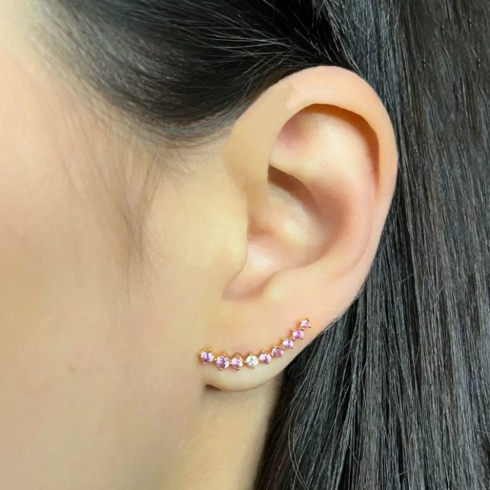Earrings in rose gold set with pink sapphires and brilliant-cut diamonds.