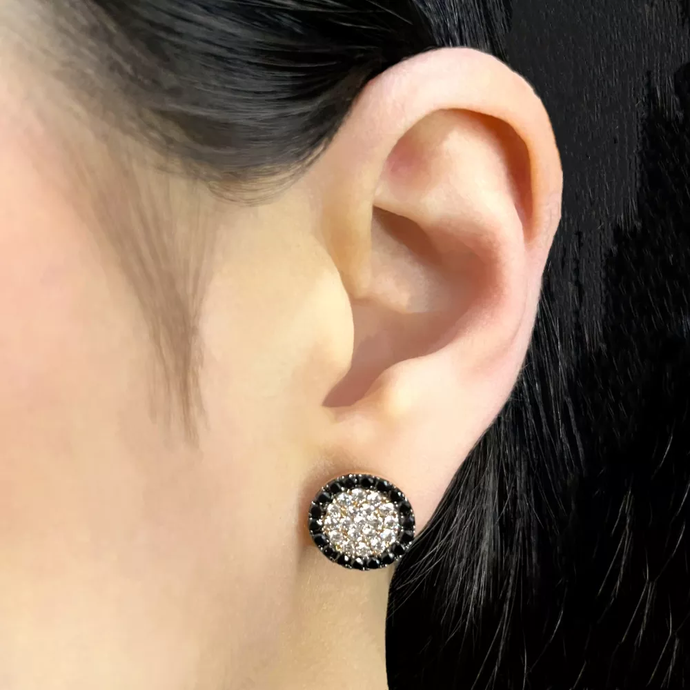 Earrings in rose gold set with brilliant-cut Fancy Black diamonds and colorless brilliant-cut diamonds.