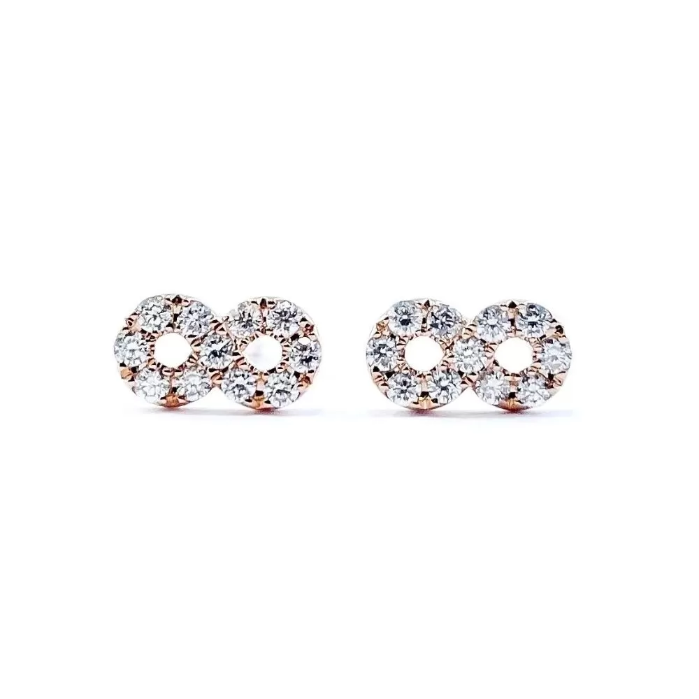 Aros en oro rosa con diamantes talla brillante.