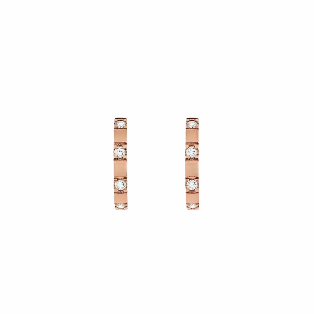 Argolla en oro rosa con diamantes talla brillante.