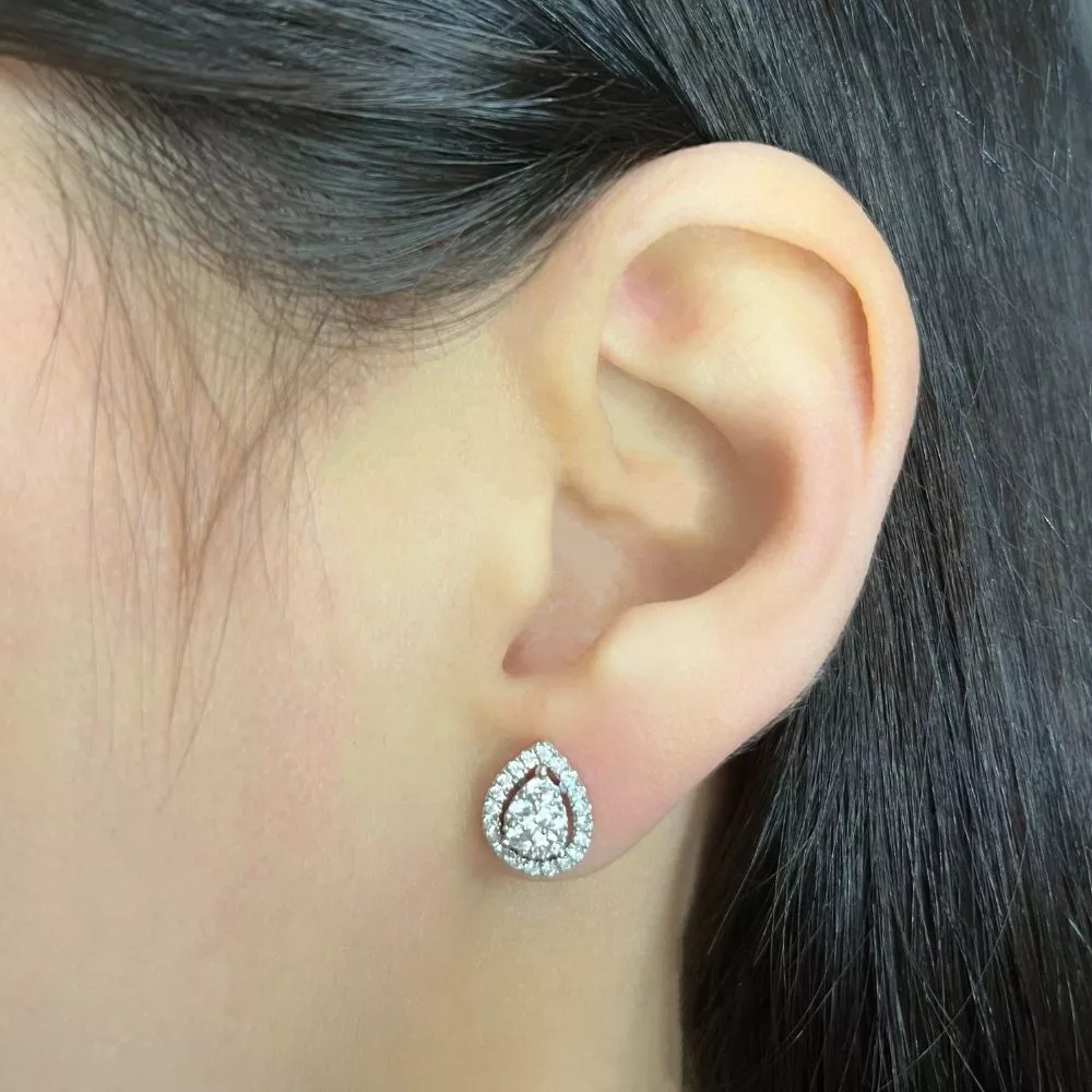Jacket earrings in white gold set with brilliant-cut diamonds.