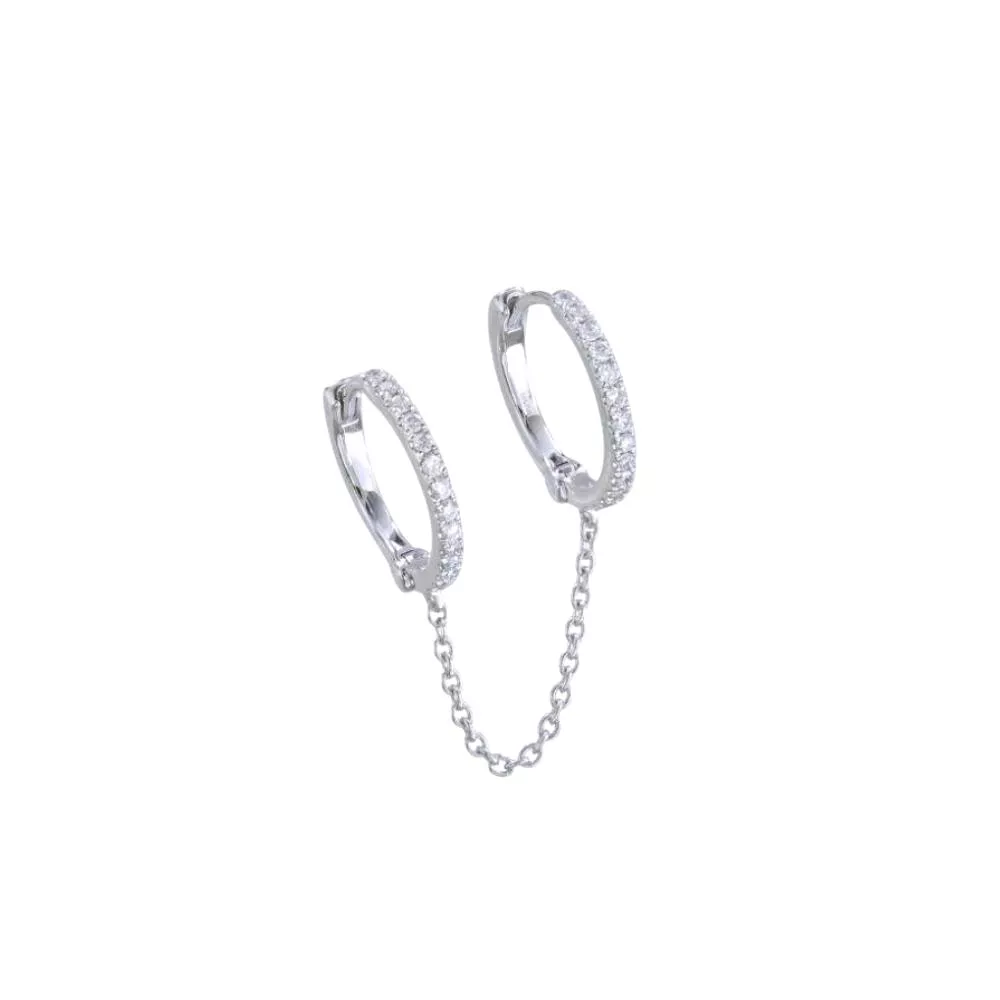 Piercing en oro blanco con diamantes talla brillante. 