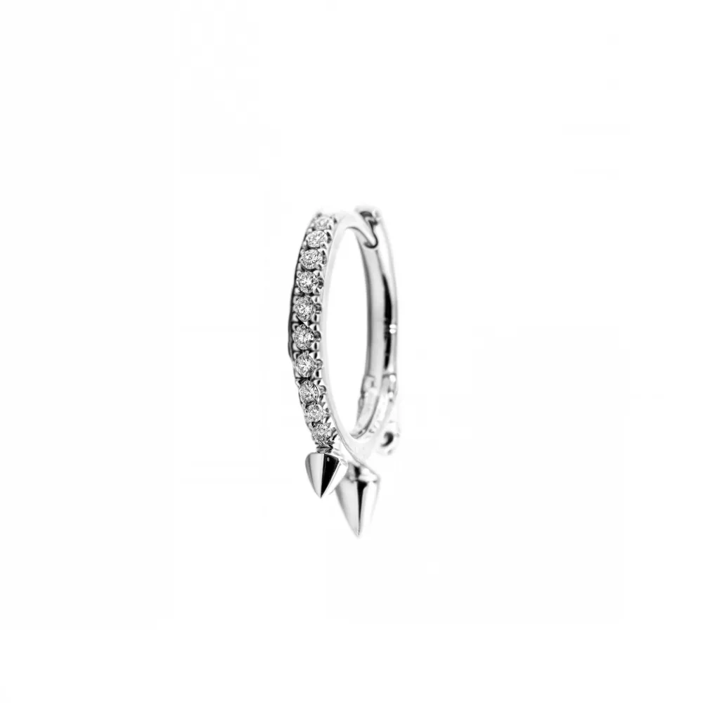 Piercing en oro blanco con diamantes talla brillante. 