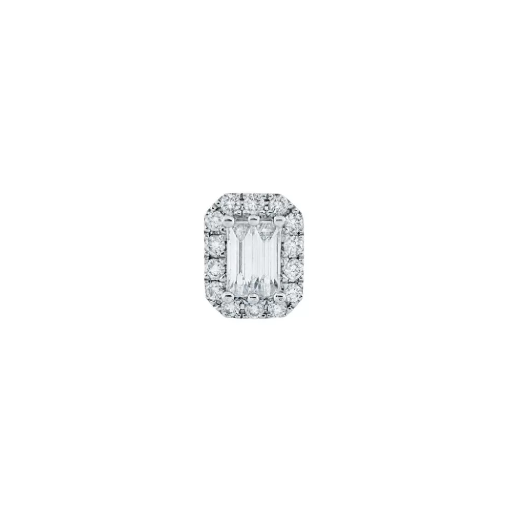 Aro en oro blanco con diamantes talla baguette y brillante.