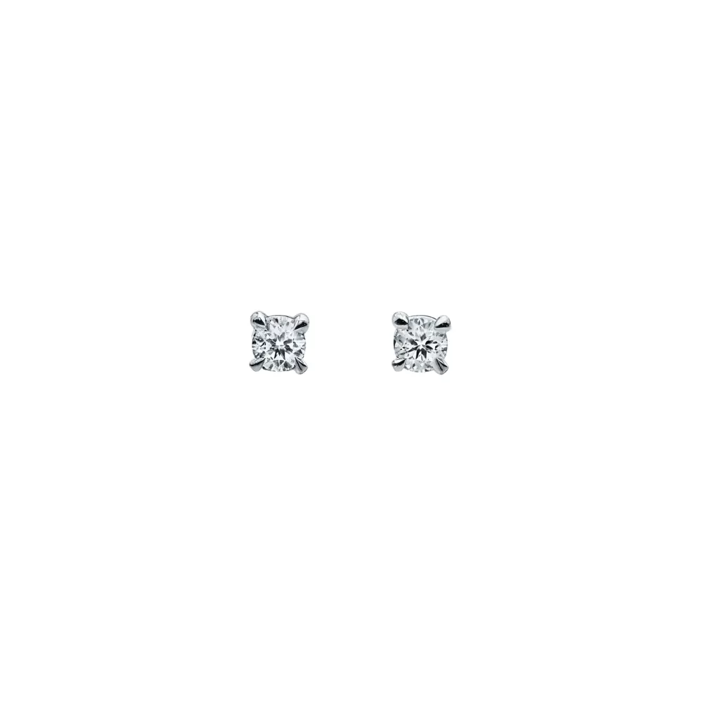 Aros solitarios en oro blanco con diamantes talla brillante (0.14 ct total).