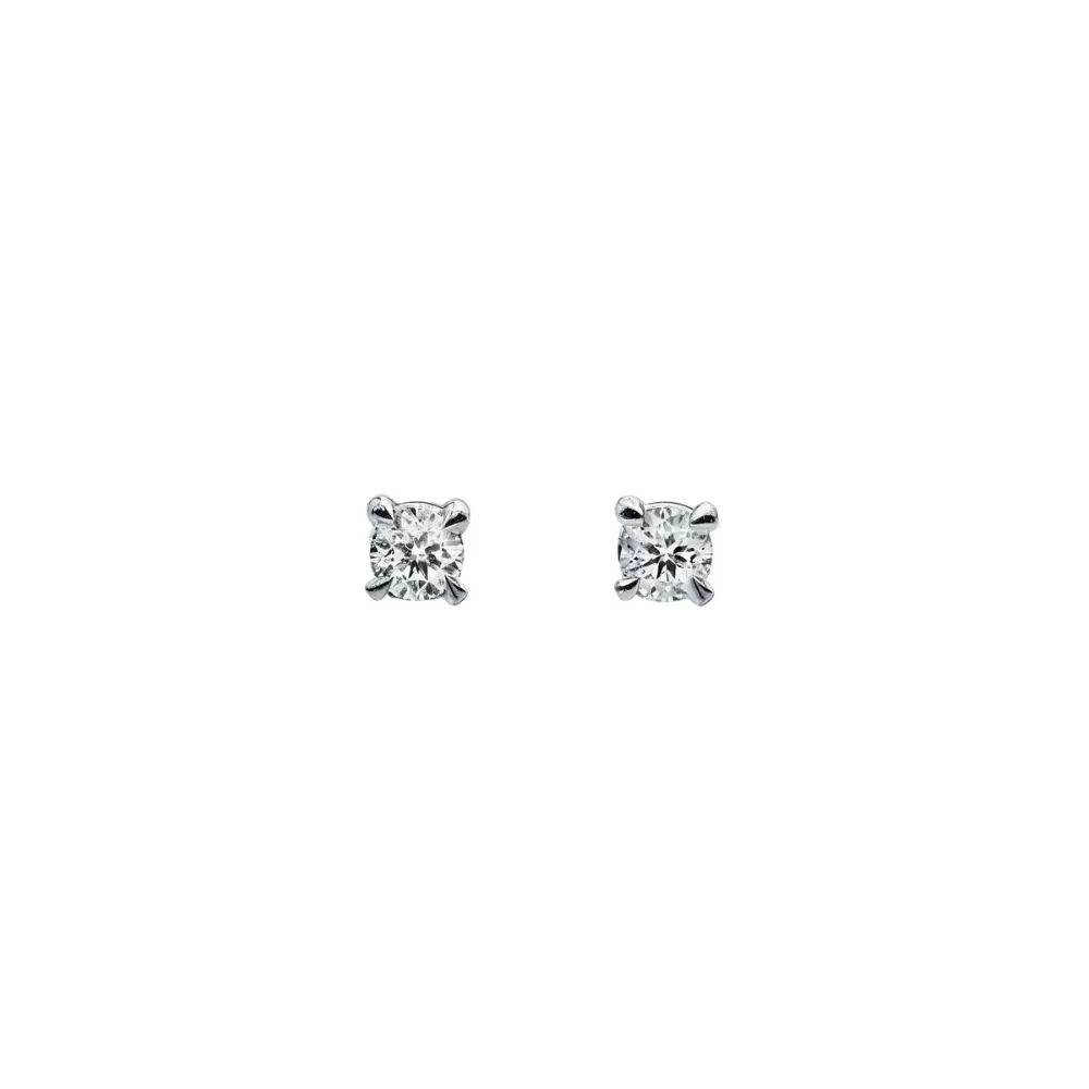 Aros solitarios en oro blanco con diamantes talla brillante (0.22 ct total).