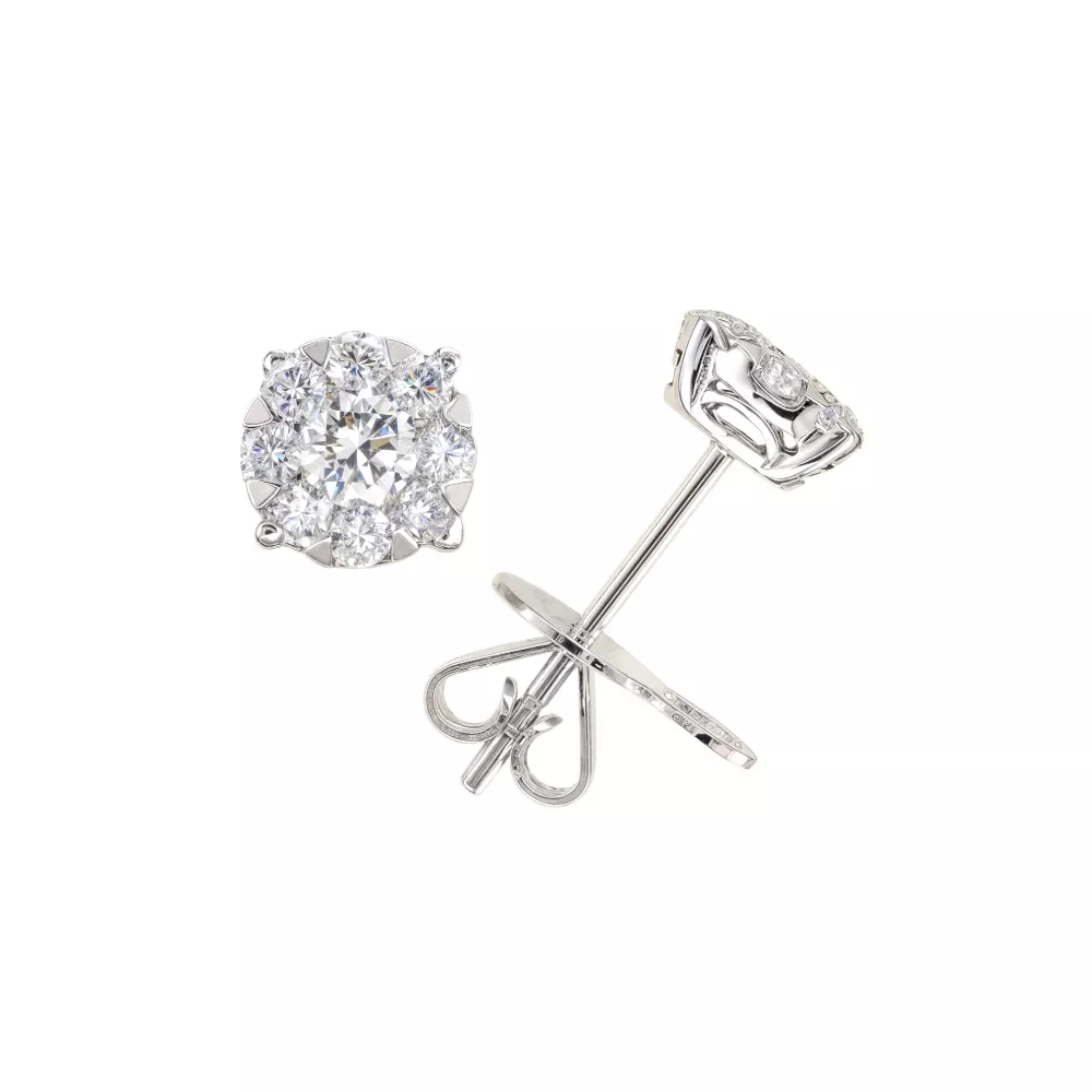 Aros en oro blanco con diamantes talla brillante.  Aros en oro blanco con diamantes talla brillante.