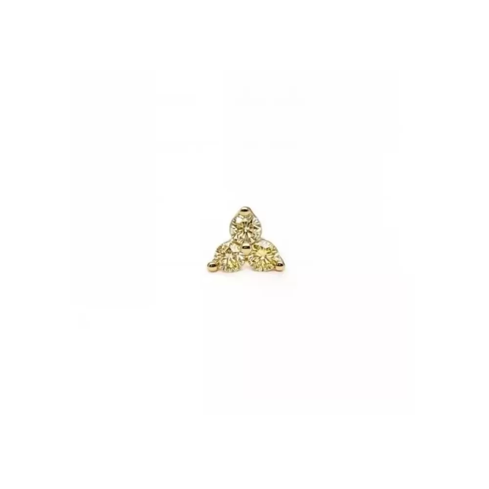 Piercing en oro amarillo con diamantes Fancy Yellow talla brillante.