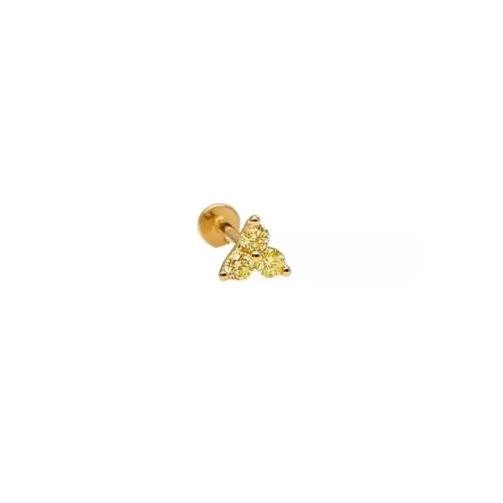 Piercing en oro amarillo con diamantes Fancy Yellow talla brillante.