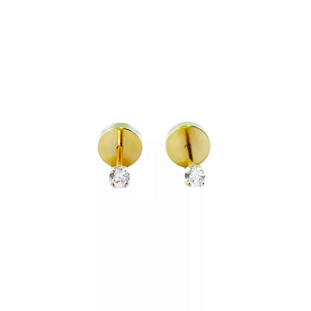 Abridores en oro amarillo con zafiros incoloros.