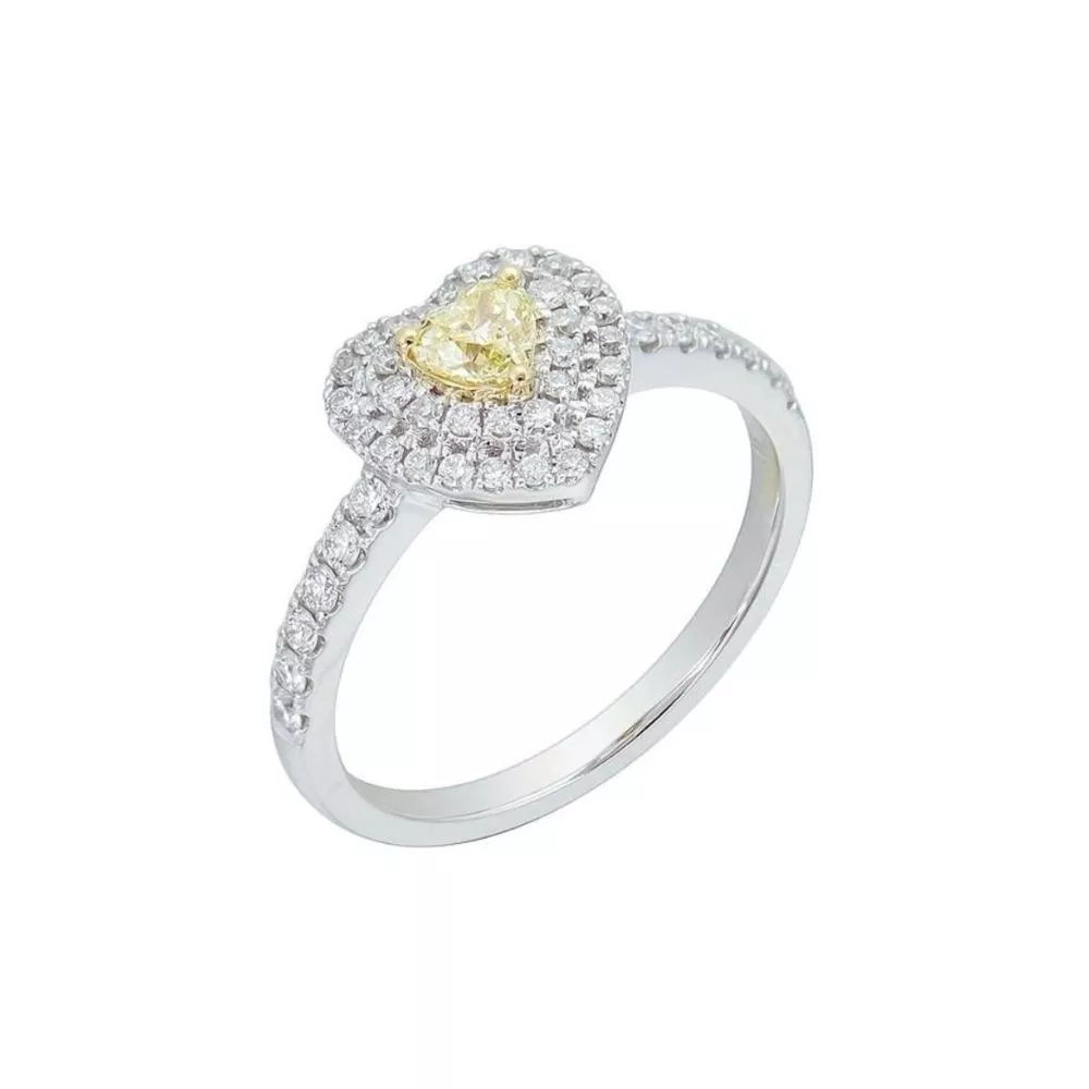 Anillo de Compromiso en oro blanco con diamante Fancy Yellow talla corazón (0.245 ct).