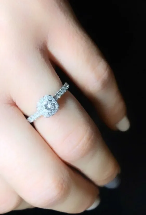 Engagement ring in white gold set with brilliant-cut diamond (0.166 ct, color F, clarity SI1).