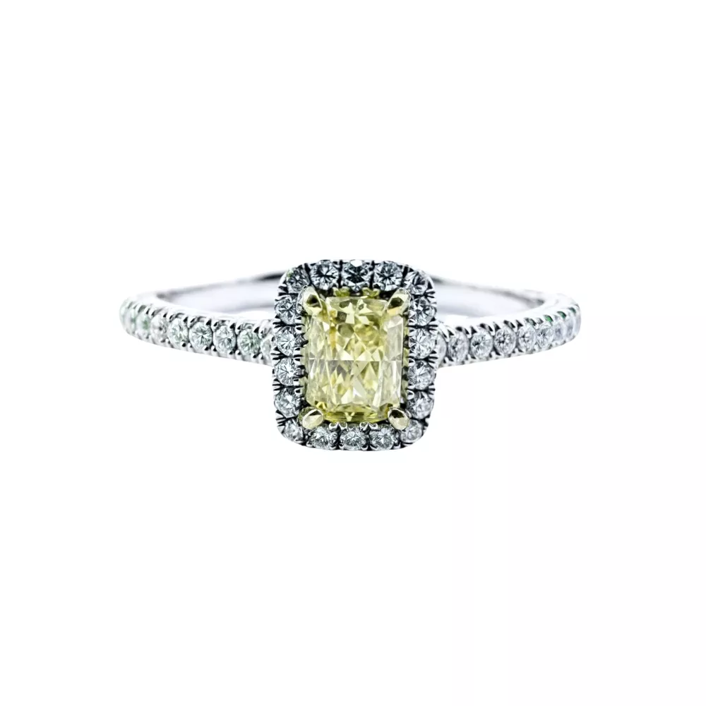 Anillo de Compromiso en oro blanco con diamante Fancy Intense Yellow talla Especial (0.42 ct).