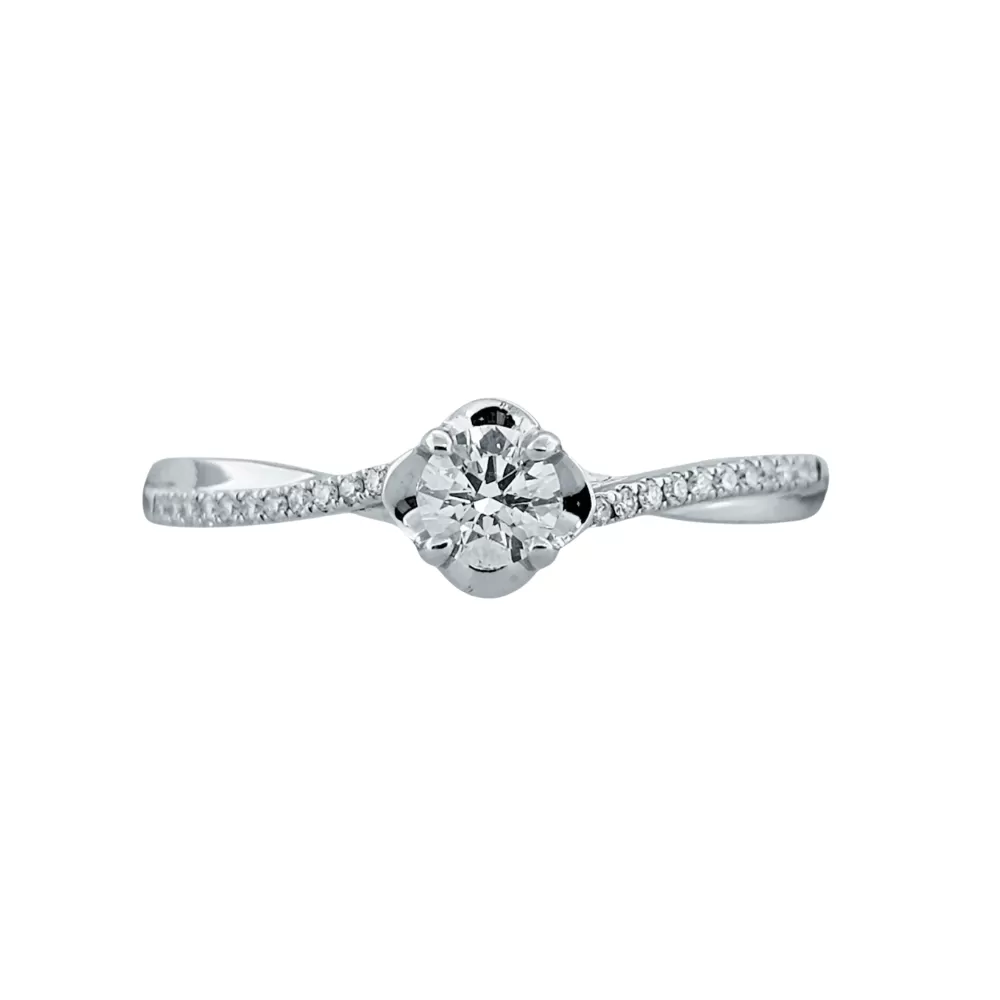 Anillo de compromiso en oro blanco con diamantes talla brilante (0.18 ct, color F, pureza VS).
