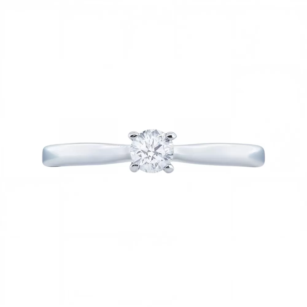 Anillo Solitario en oro blanco con diamante talla brillante (0.10 ct, color G, pureza SI).
