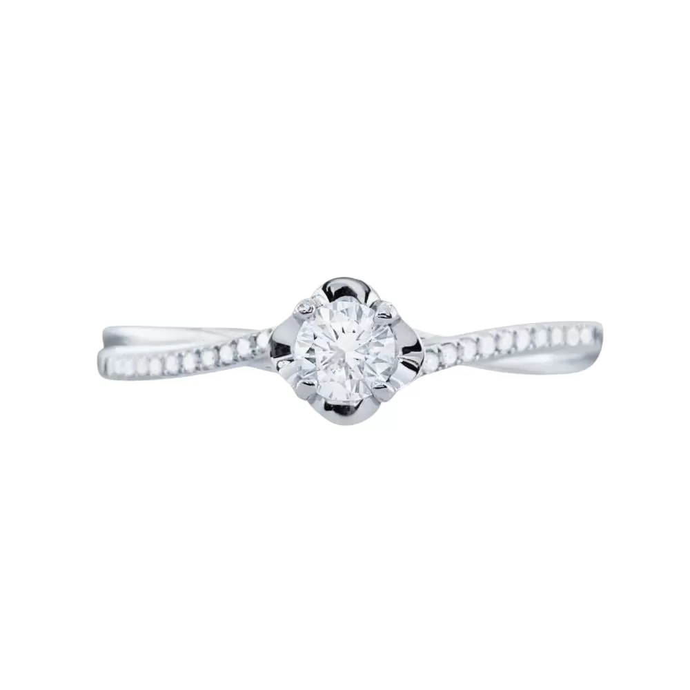 Anillo de Compromiso moderno en oro blanco con diamantes talla brillante (0.16 ct, color G, pureza VS2).