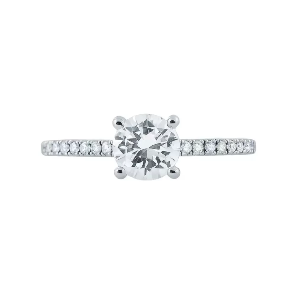 Anillo de Compromiso en oro blanco con diamante talla brillante (0.70 ct, color J, pureza VSI2).