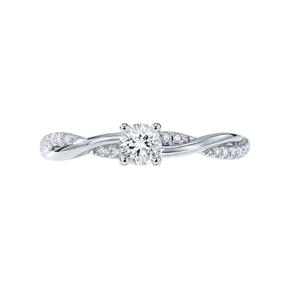 Anillo de Compromiso en oro blanco con diamantes talla brillante (0.21 ct, color D, pureza VS1).