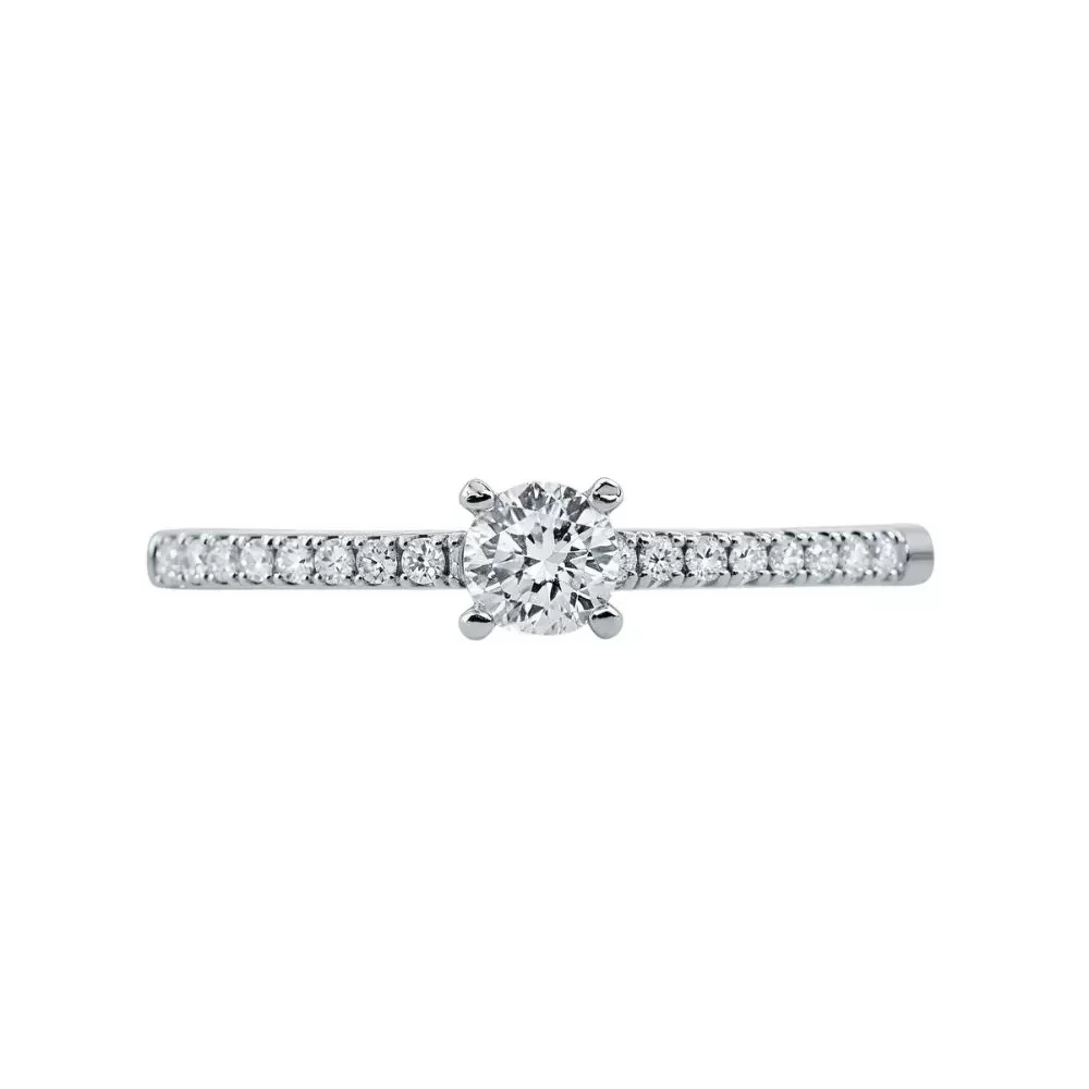 Anillo de Compromiso en oro blanco con diamantes talla brillante (0.18 ct, color D, pureza VS1).