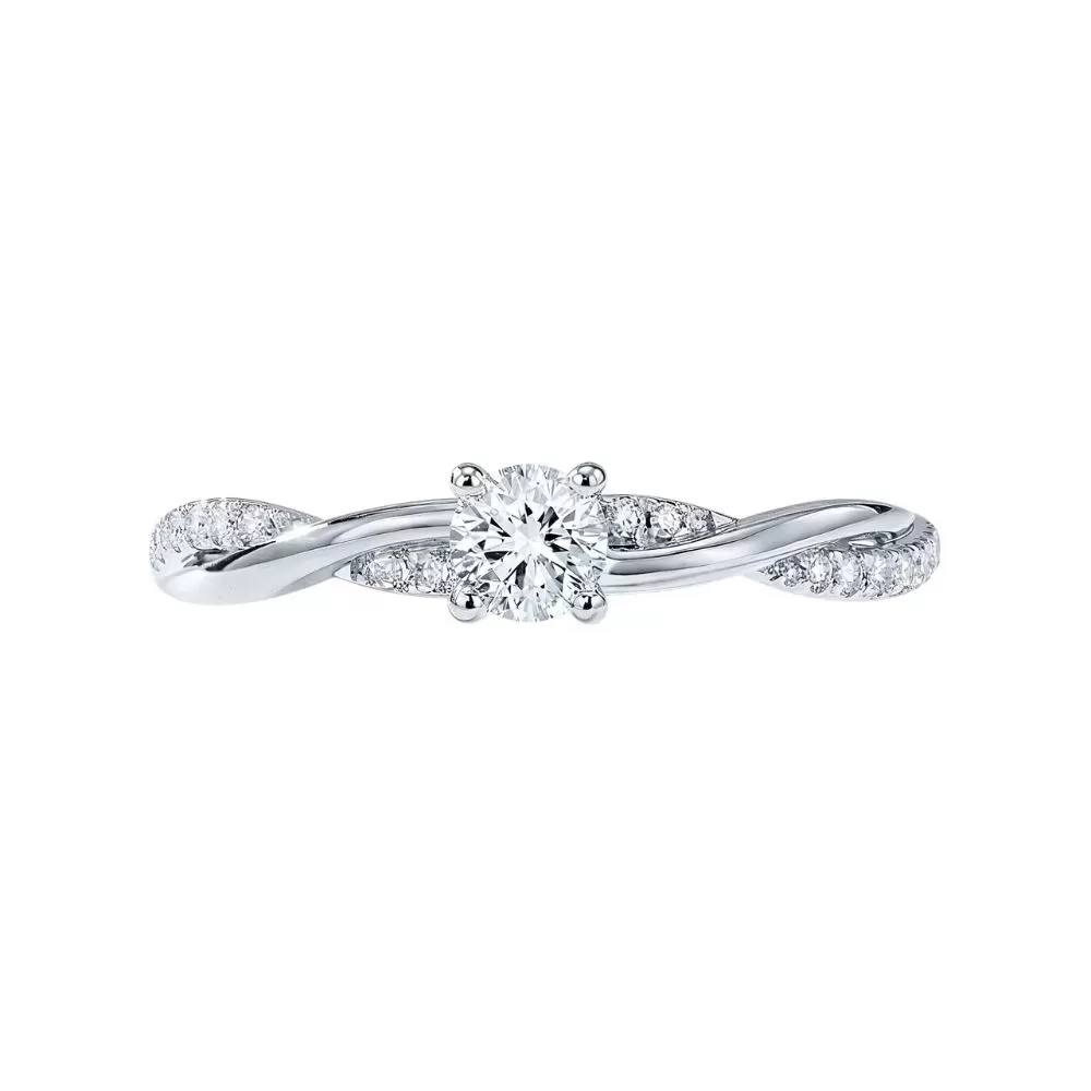 Anillo de Compromiso en oro blanco con diamantes talla brillante (0.20 ct, color D, pureza VS1).