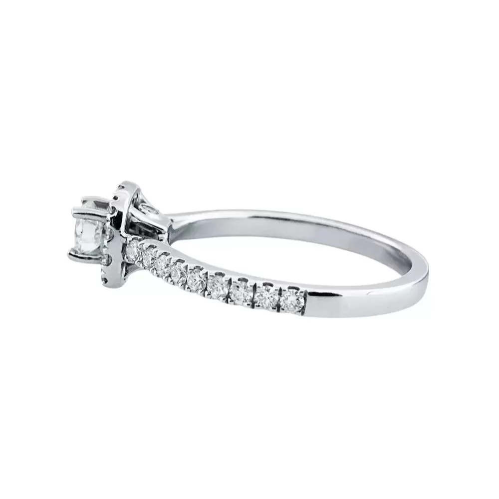 Anillo de Compromiso en oro blanco con diamante talla brillante (0.30 ct, color H, pureza VS2).