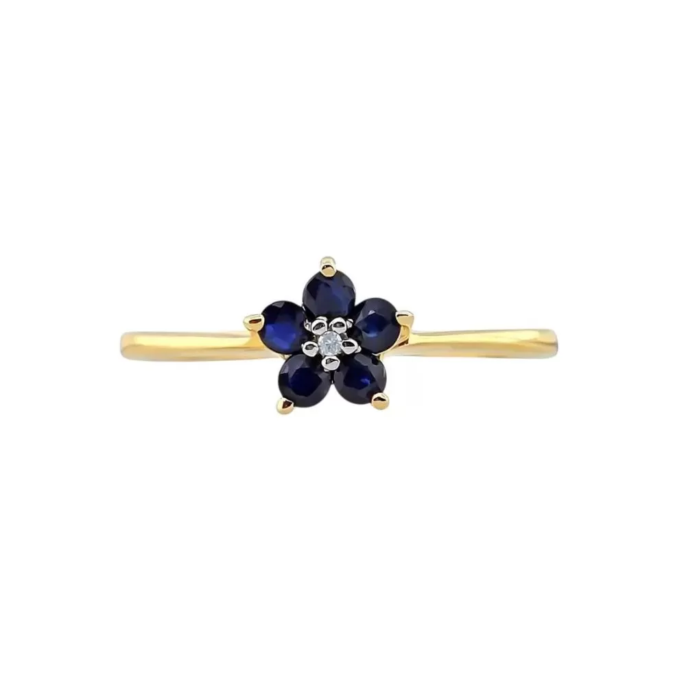 Anillo en oro amarillo con zafiros talla brillante y diamante talla brillante.