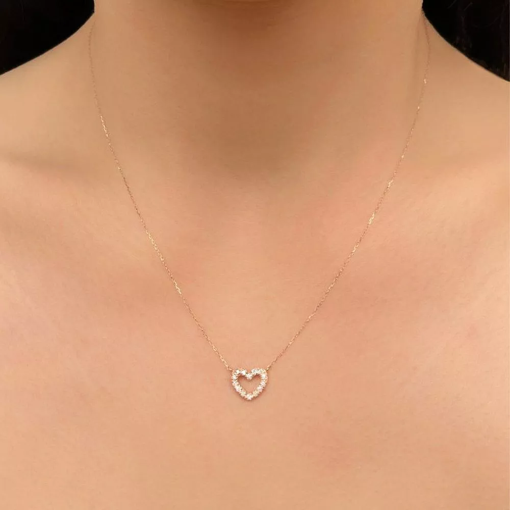 Necklace in rose gold set with brilliant-cut diamonds.