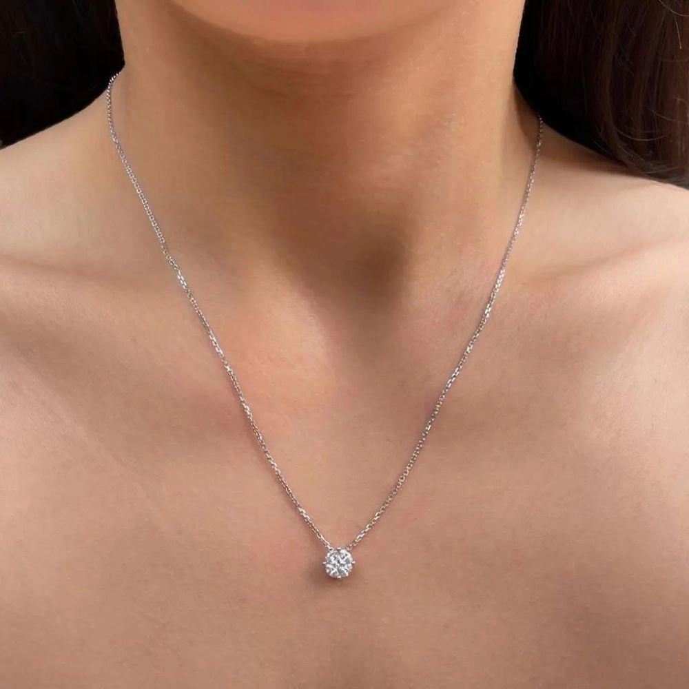 Necklace in white gold set with princess-cut and marquise-cut diamonds.