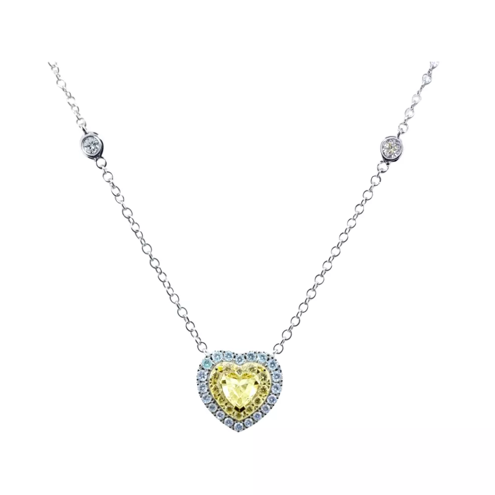 Colgante en oro blanco con diamante Fancy Yellow talla corazón
