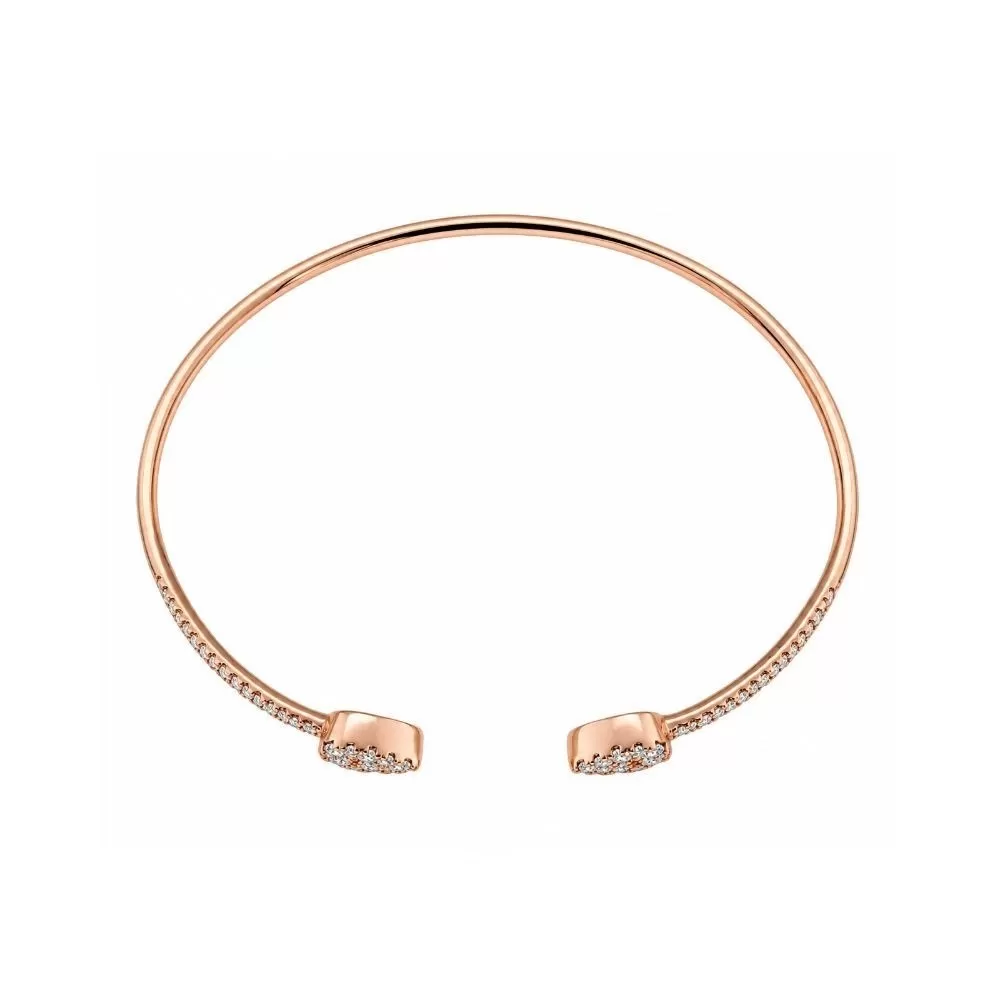 Brazalete en oro rosa con diamantes talla brillante.