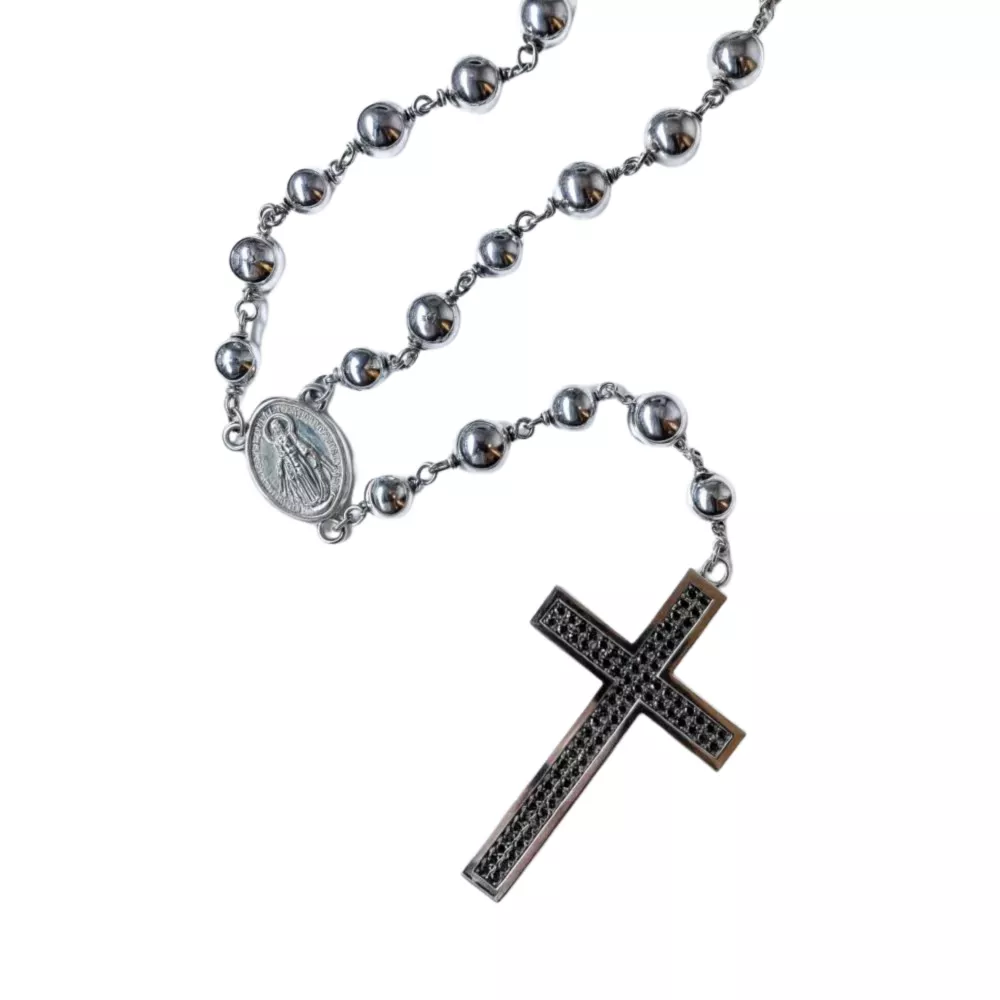 Platinum rosary with white gold cross and brilliant-cut Fancy Black diamonds.