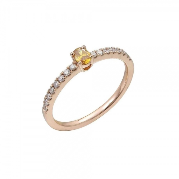 Engagement ring in rose gold set with oval-cut Fancy Vivid Orangy Yellow diamond (0.11 ct, clarity VS2).