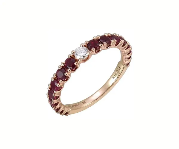 Ring in rose gold set with brilliant-cut rubies and a brilliant-cut diamond.