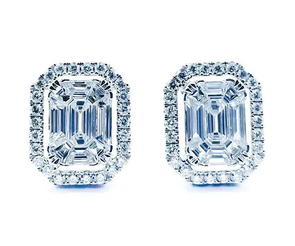 Earrings in white gold set with trapezoid-cut and brilliant-cut diamonds.