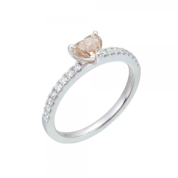Engagement ring in white gold set with heart-cut Fancy Yellowish Brown diamond (0.42 ct, clarity I1).