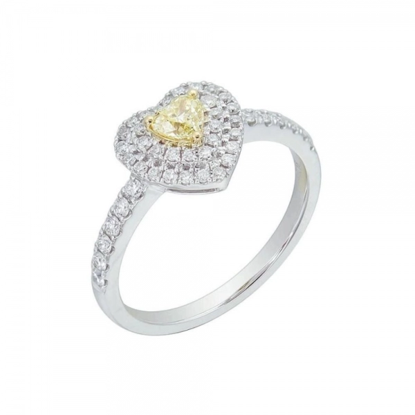 Engagement ring in white gold set with heart-cut Fancy Yellow diamond (0.245 ct).