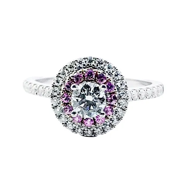 Engagement ring in white gold set with brilliant-cut diamond (0.30 ct, color I, clarity SI1) and pink sapphires.