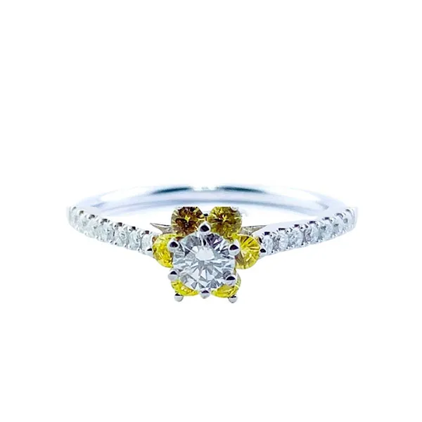 Engagement ring in white gold set with brilliant-cut diamond (0.18 ct, color F, clarity VVS2) and brilliant-cut yellow sapphires.