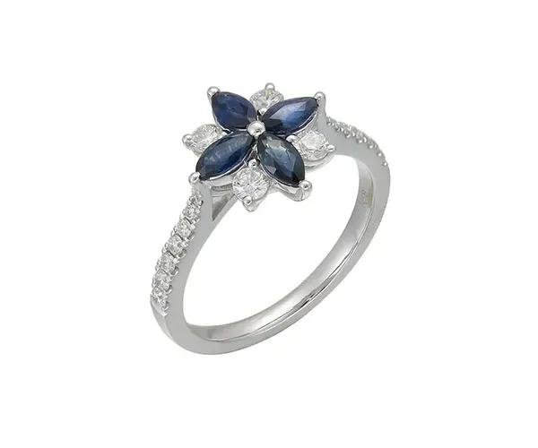 Ring in white gold set with marquise-cut sapphires and brilliant-cut diamonds.